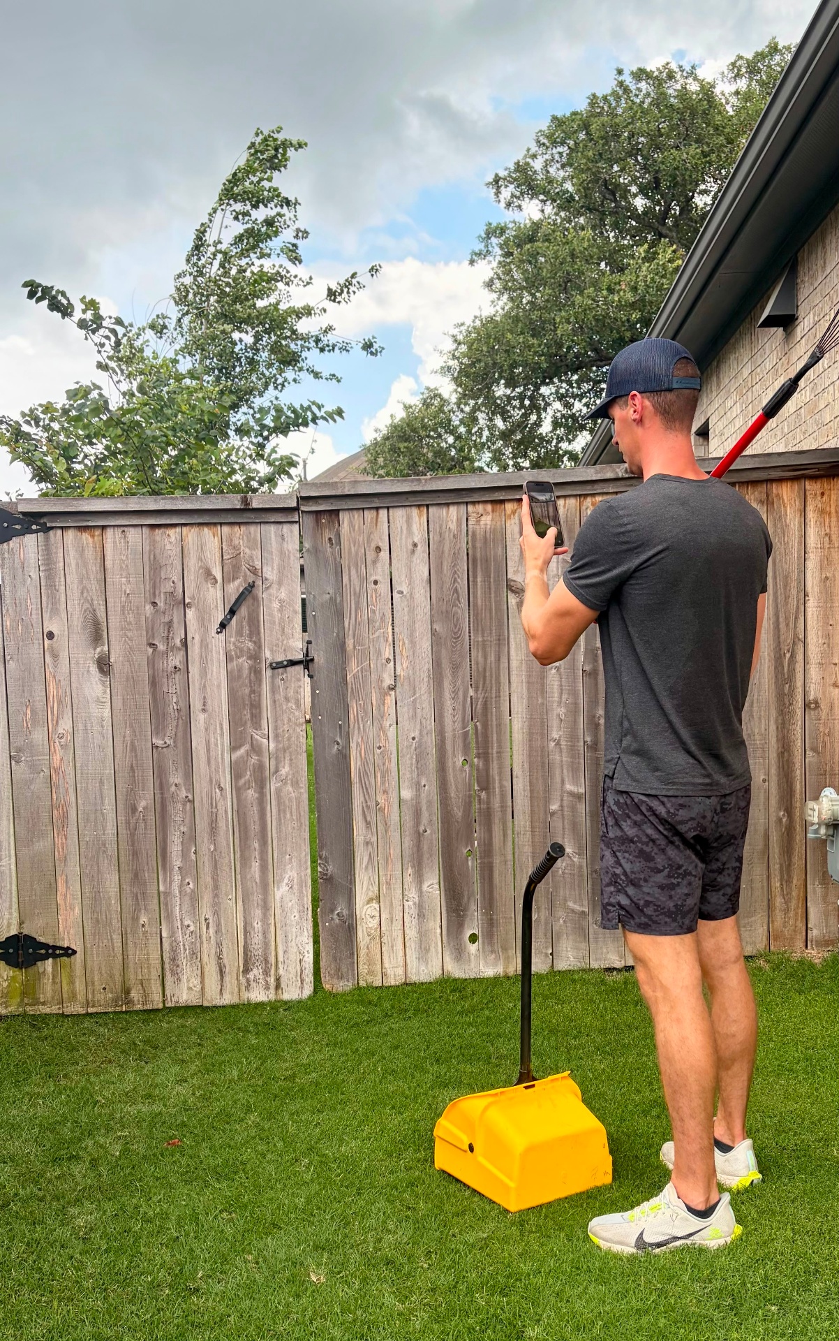Off Doody technician scooping pet waste in a clean Texas backyard
